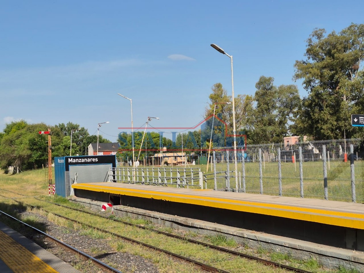LOTE CON LOCALES EN CENTRO DE MANZANARES - OPORTUNIDAD DE INVERSION
