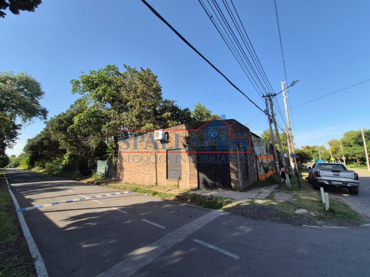 LOTE CON LOCALES EN CENTRO DE MANZANARES - OPORTUNIDAD DE INVERSION